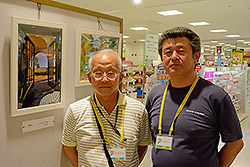 05 写真展会場にて：丹羽さん（左）と坂本さん（右）  (撮影：田村 努)